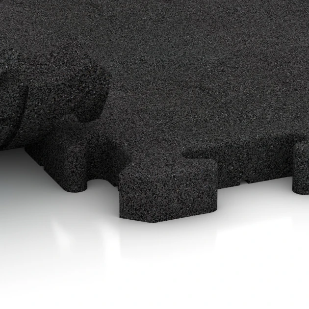 Großaufnahme vom Verbindungssystem von WARCO-Boden 2960 - Interlocking playground safety tile im Farbdesign Anthracite. Abmessungen 50 x 50 x 4 cm | 0,25 m².