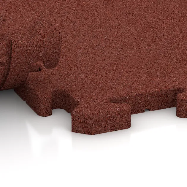 Großaufnahme vom Verbindungssystem von WARCO-Boden 2768 - Interlocking playground safety tile im Farbdesign Brick red. Abmessungen 500 x 500 x 30 mm.