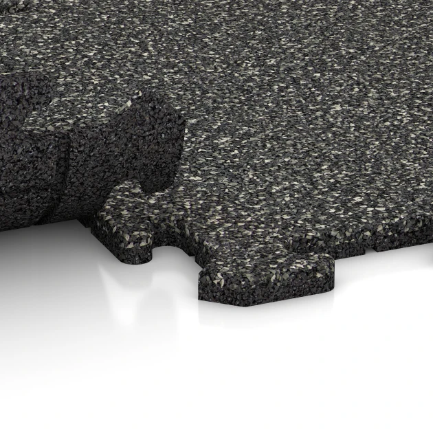 Großaufnahme vom Verbindungssystem von WARCO-Boden 4209 - Sports flooring tile 1.8 cm im Farbdesign Dark Grey Granite. Abmessungen 500 x 500 x 18 mm.