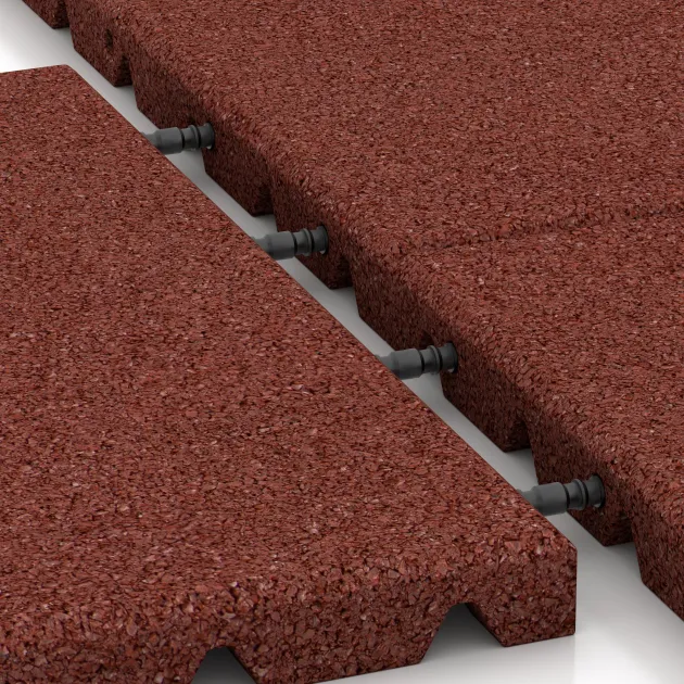 Großaufnahme vom Verbindungssystem von WARCO-Boden 0521 - Playground safety tile im Farbdesign Brick red. Abmessungen 400 x 400 x 30 mm.