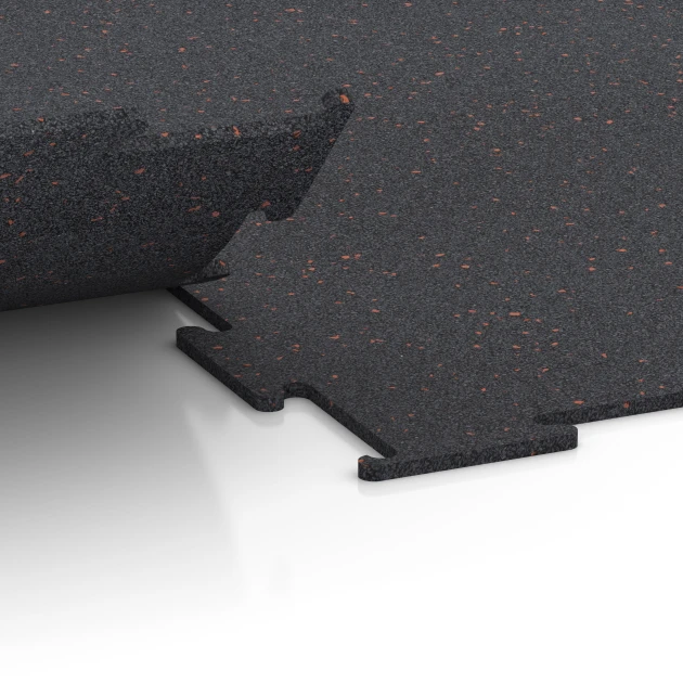 Großaufnahme vom Verbindungssystem von WARCO-Boden 6450 - Fitness Floor Compact im Farbdesign Light Red Speckled. Abmessungen 100 × 100 × 0,8 cm.