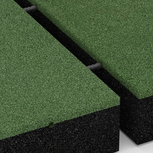 Großaufnahme vom Verbindungssystem von WARCO-Boden 6279 - Playground Safety Tile – 300 cm im Farbdesign Grass green. Abmessungen 50 x 50 x 11 cm.
