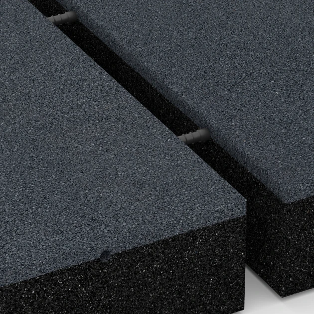 Großaufnahme vom Verbindungssystem von WARCO-Boden 6281 - Playground Safety Tile – 300 cm im Farbdesign Slate grey. Abmessungen 50 x 50 x 11 cm.