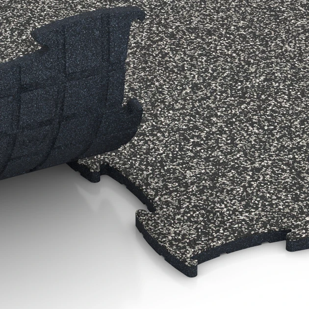 Großaufnahme vom Verbindungssystem von WARCO-Boden 6922 - Exhibition Click Floor Tile im Farbdesign Dark Grey Granite. Abmessungen 97,1 x 97,1 × 1,8 cm.
